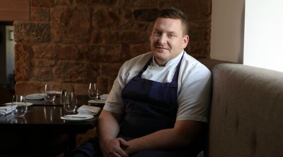 Gary McDermott and kitchen staff walk out of Pentonbridge Inn