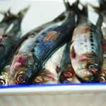 Baked, smoked bacon-wrapped sardines with gooseberry and green peppercorn relish by James Mackenzie