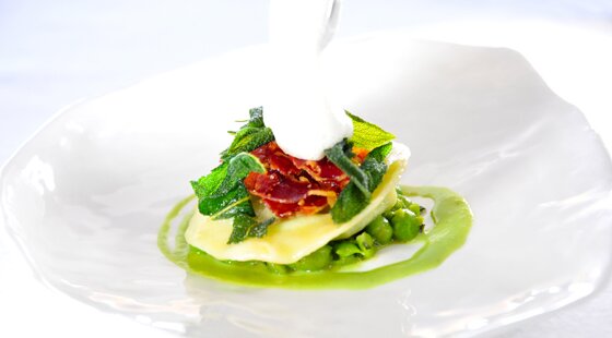 Recipe of the week: Liquid pea ravioli with Serrano ham, crispy sage and Parmesan emulsion