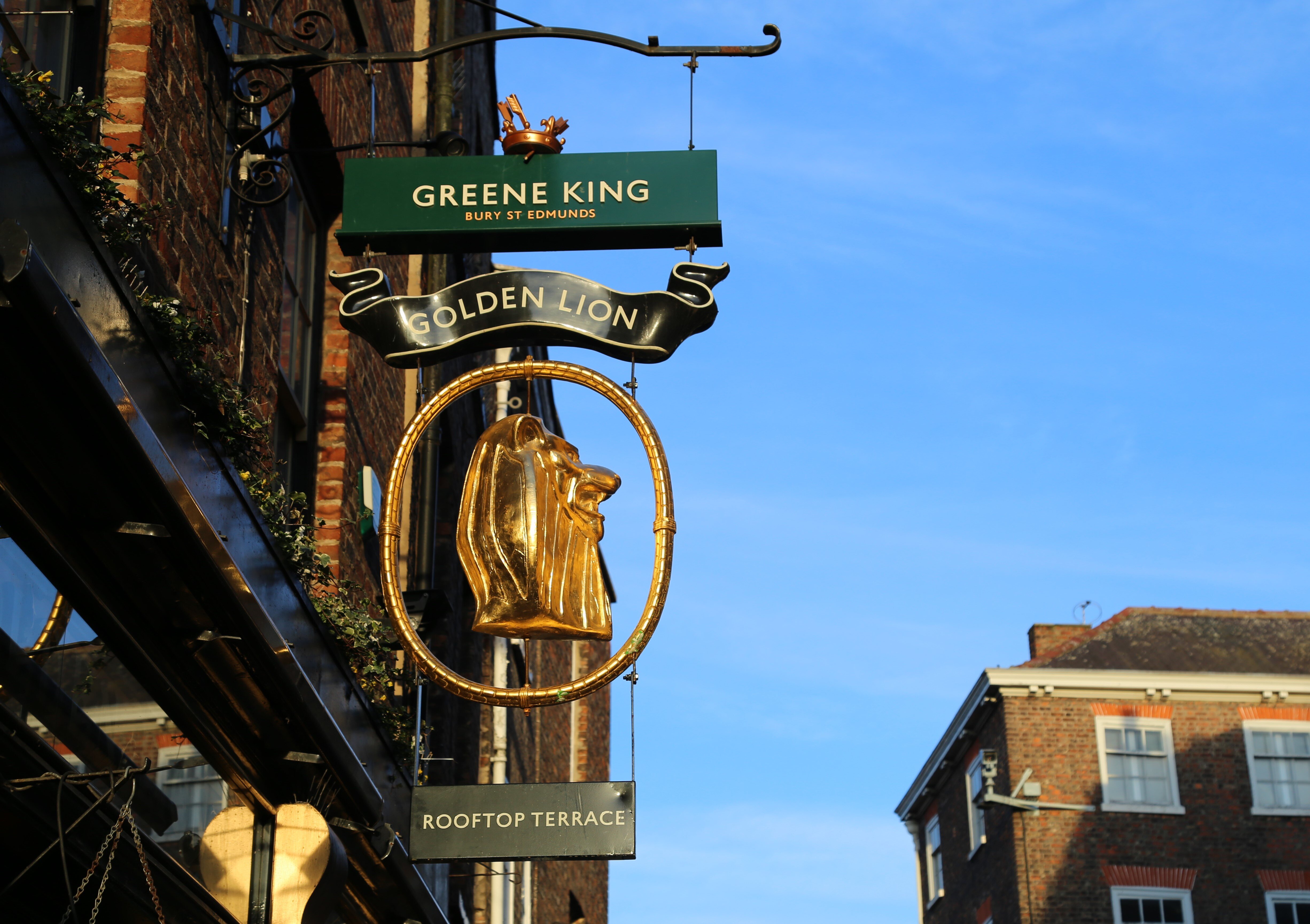 Greene King reports revenue of £2.18b
