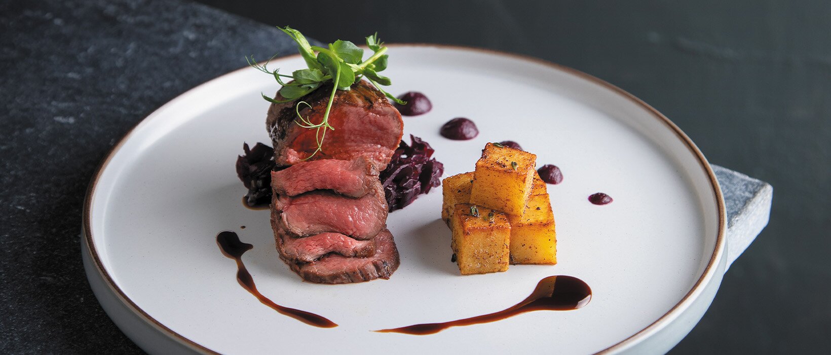 Venison loin, green peppercorns, red cabbage and game fondants from Fifty Years: Kinloch Lodge