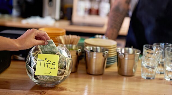 Government pushes back changes to tipping law until October