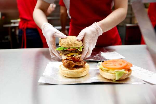 Five Guys and Whitbread named for paying below minimum wage