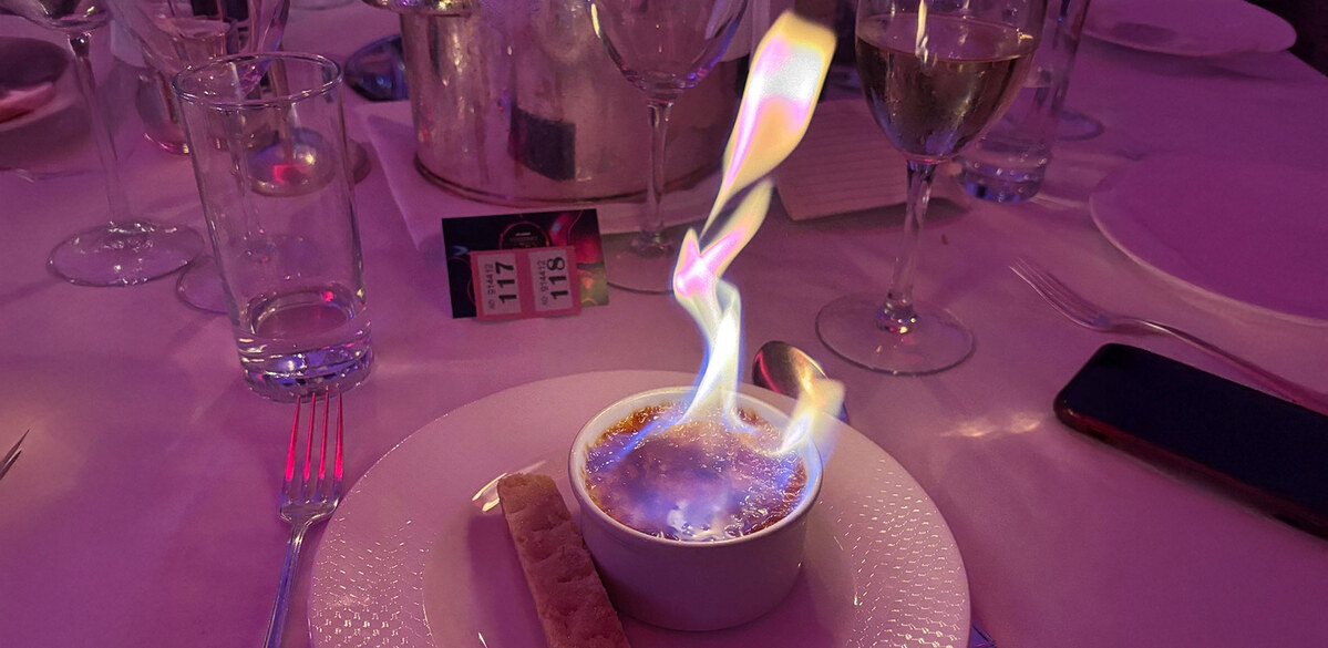 Guests dined on mozzarella and pesto arancini, confit duck leg and flaming crème brûleé 