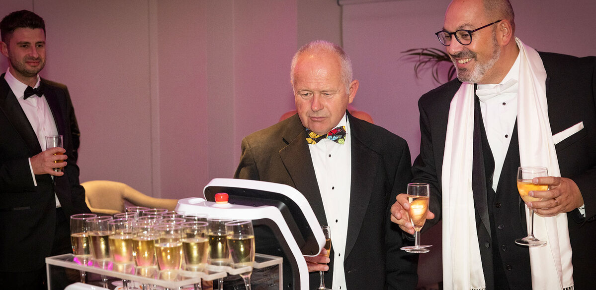 Lolly’s robot waiter serves guests with welcome drinks