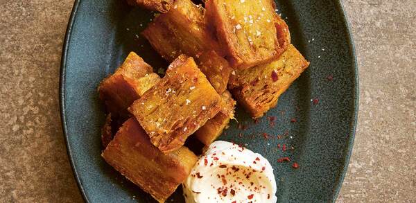 Crunchy latkes with a 30-clove garlic sauce from Bubala