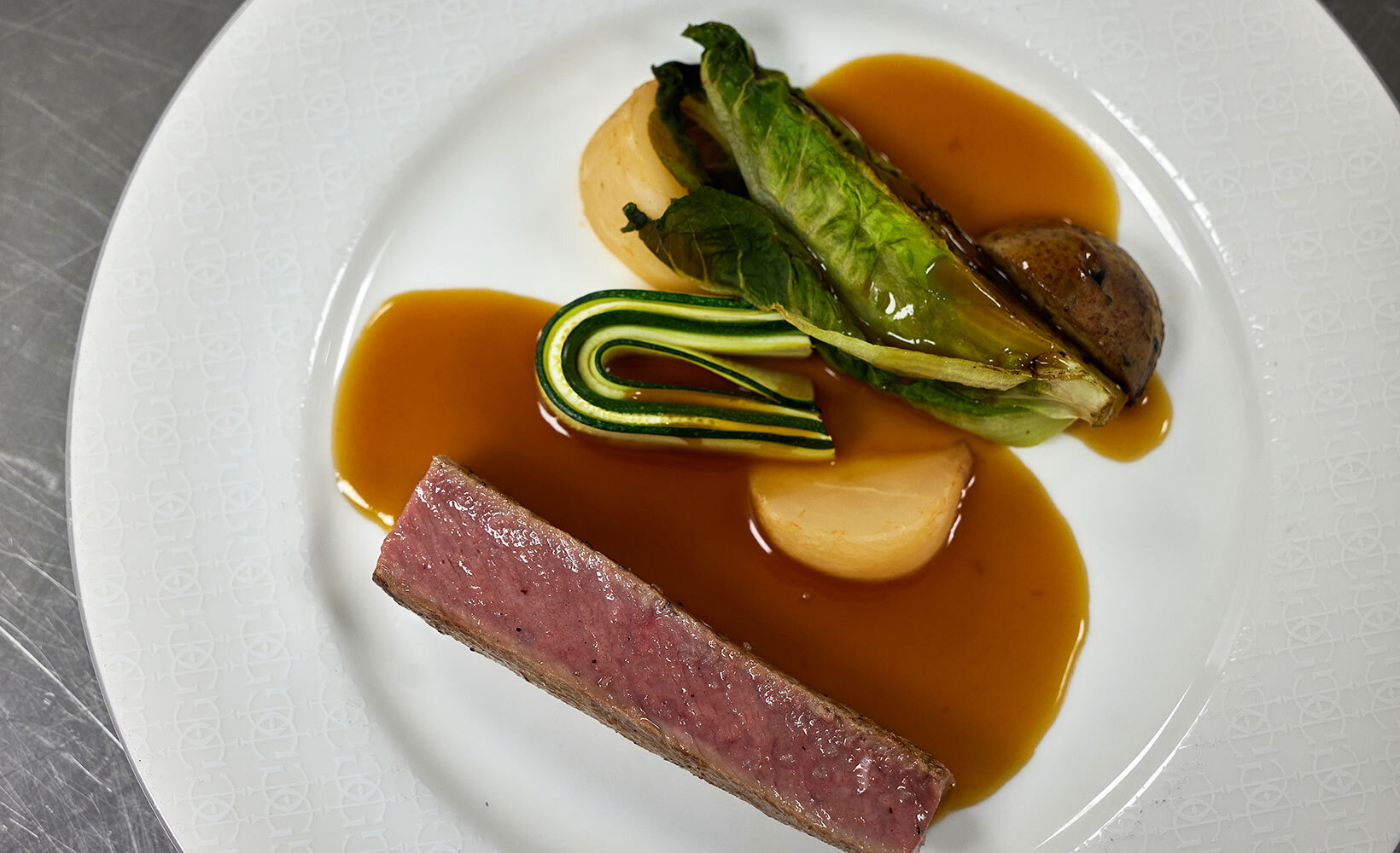 Ben Wilkinson, head chef at the Pass at South Lodge, created the main of roast loin of lamb with dumpling of lamb shoulder and liver, grilled gem lettuce and roasted new potatoes